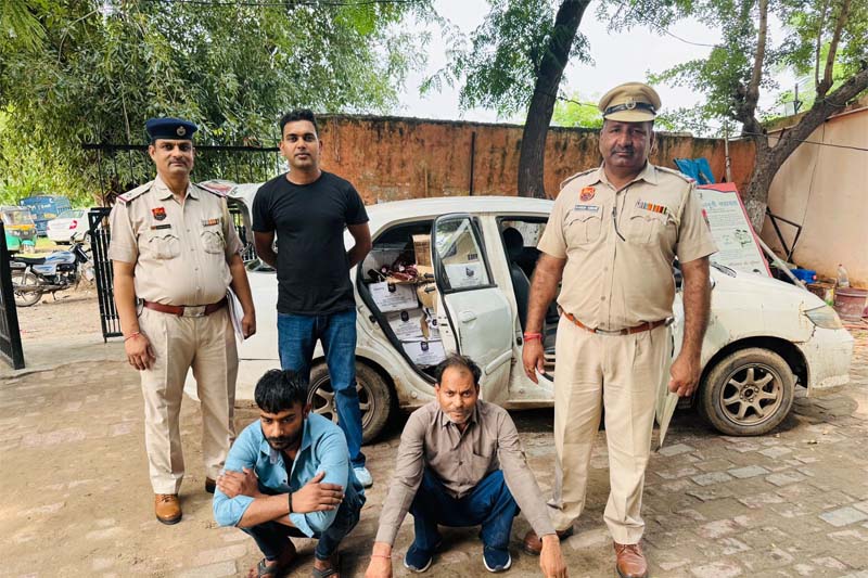 Faridabad Police arrested two accused smuggling liquor in a Honda City car, 51 boxes of illegal liquor recovered