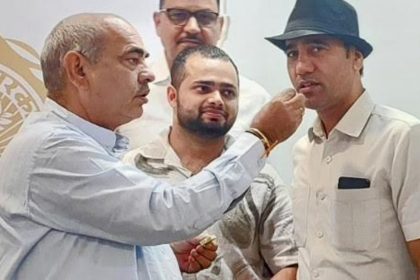 MLA Mulchand Sharma honors international shooters Singhraj Adhana and Manish Narwal on Haryana Day