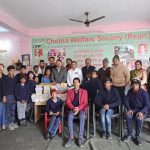 Distributed study material and snacks to disabled children