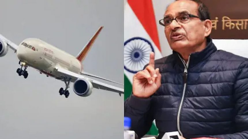 Shivraj sitting on the broken seat of Air India flight