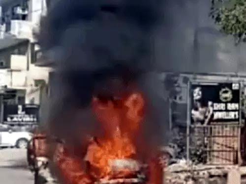 The car's battery burst and caught fire, the driver saved his life by jumping out