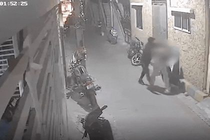 The young man touched the girl inappropriately in the middle of the road