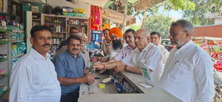 MLA Moolchand Sharma visited the market under the GST Savings Festival and made the public aware.