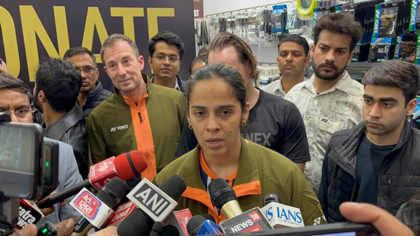 Saina Nehwal and Peter Gade distributed rackets at World Street by Omaxe, along with Yonex, to children in need.