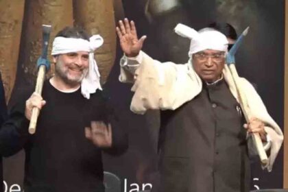 Rahul tied a cloth around his head and placed a hoe on his shoulder.