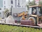 DTP bulldozers run on illegal construction, demolish banquet hall and hotel