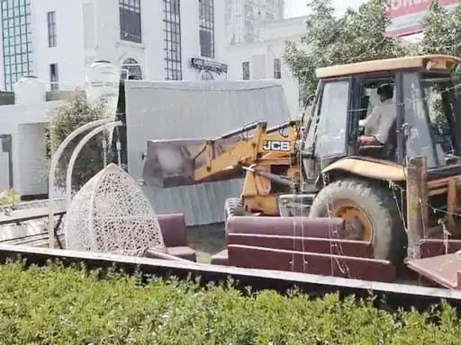 DTP bulldozers run on illegal construction, demolish banquet hall and hotel