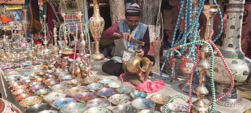 National Award winner Hussain brings world record engraved plate to the fair