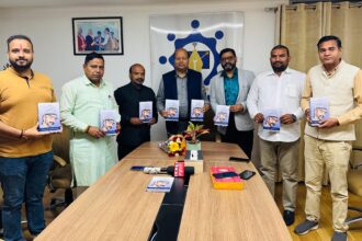 SVSU Vice Chancellor Professor Dinesh Kumar releasing the book by Dr. Rajesh Mangala