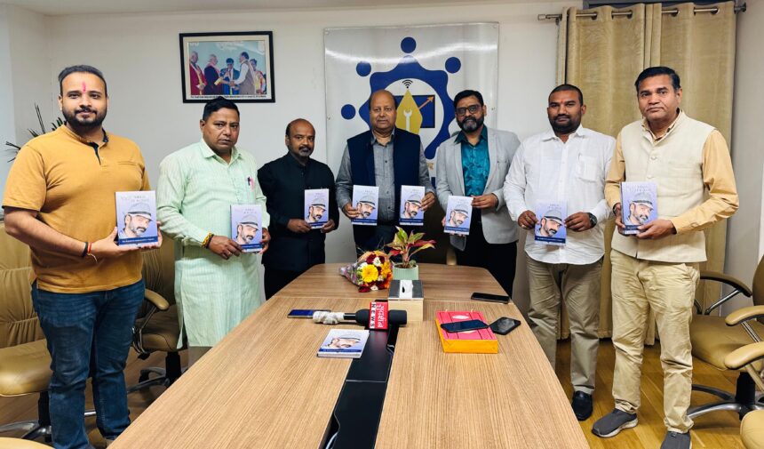 SVSU Vice Chancellor Professor Dinesh Kumar releasing the book by Dr. Rajesh Mangala