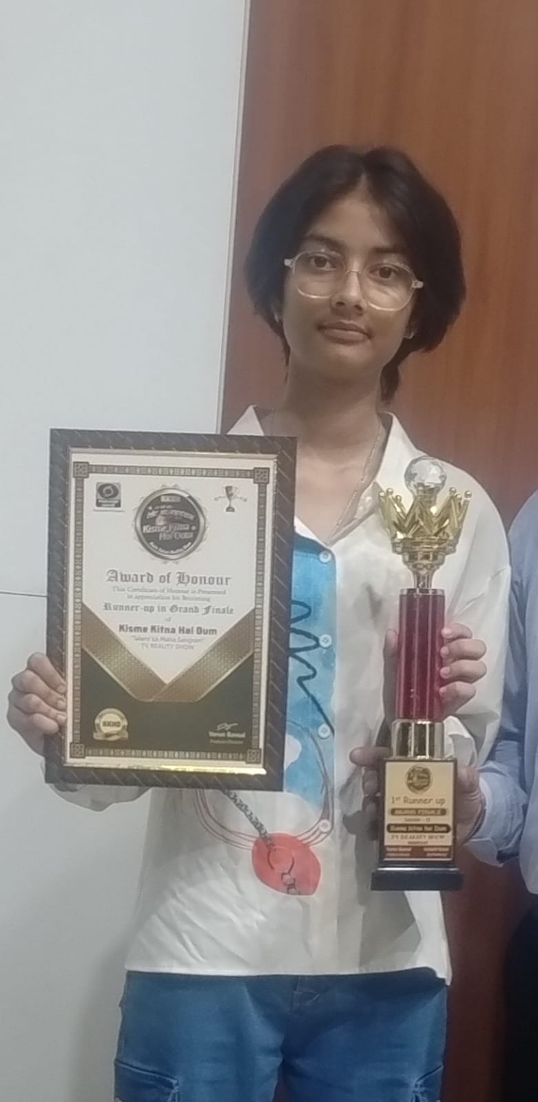 Faridabad student Riya Sharma won the first place in the drawing competition at the grand finale of the TV reality show held in Chandigarh.